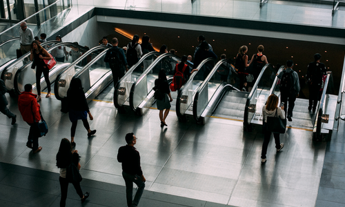 People walking on escalators