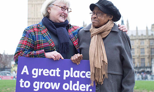 Age UK campaigners outside parliament.